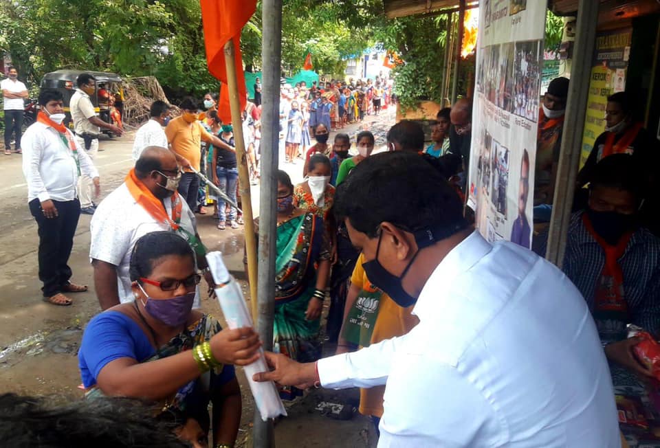 Distributed Compass Boxes and Water Bottles to School going young kids and distributed Umbrellas to the Guardians of the young children in Manori Village at the BJP office, Manori 