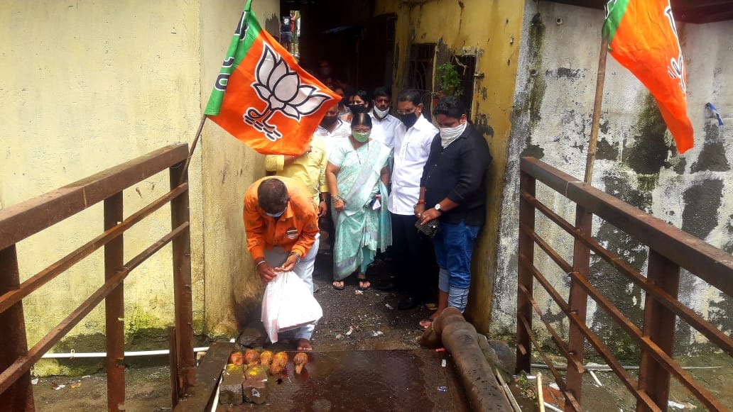 Performed Bhumi Pujan Ceremony for the Re-construction of the damaged Iron Bridge over the Sewer at Bhimnagar, Ward No.16, Gorai-01, Borivali (W) by using the MLA Development Fund.  Corporator Mrs. Anjali Khedkar, Former Corporator Mr. Shiva Shetty, BJP P