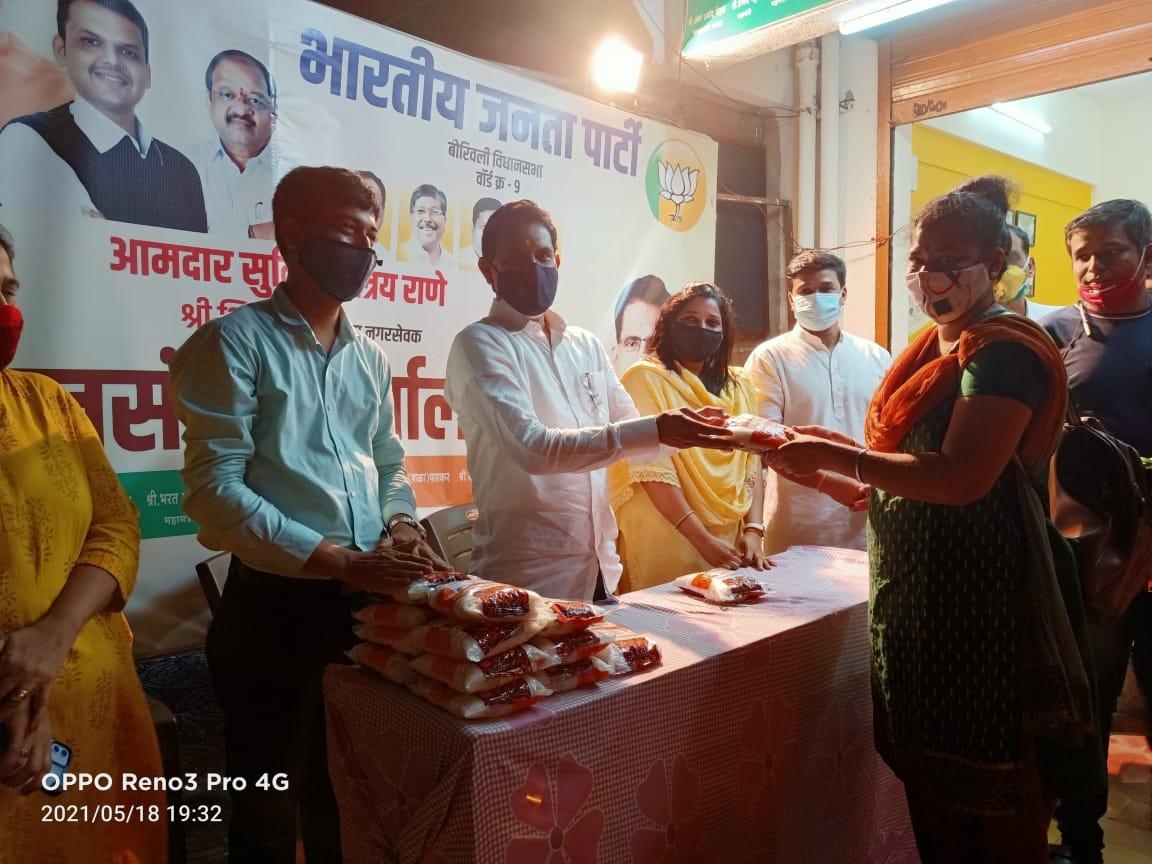 Ditribution of 5000 kg sugar is going on at BJP Public Relations office ward no. 9, Gorai 2  for the local residents as a goodwill gesture on the successful completion of the vision of collecting 5000 blood bags initiated by MP Gopal Shetty.